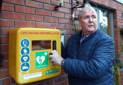 Community activist Donal pays the bills for defibrillator!