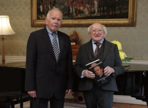 Galway author presents President with definitive biography of Loughrea novelist